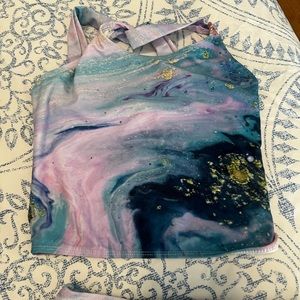 Girls 2 piece celestial bathing suit.   Size 10/12.   Never worn